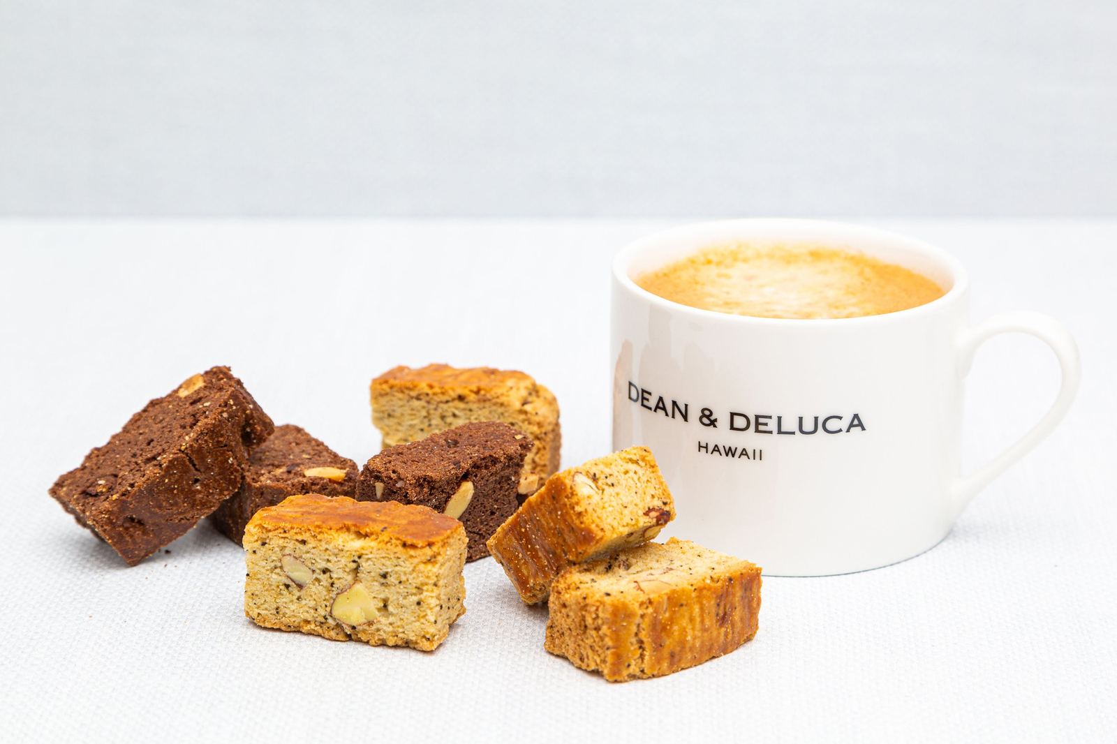 A latte and brownies styled for a cafe menu